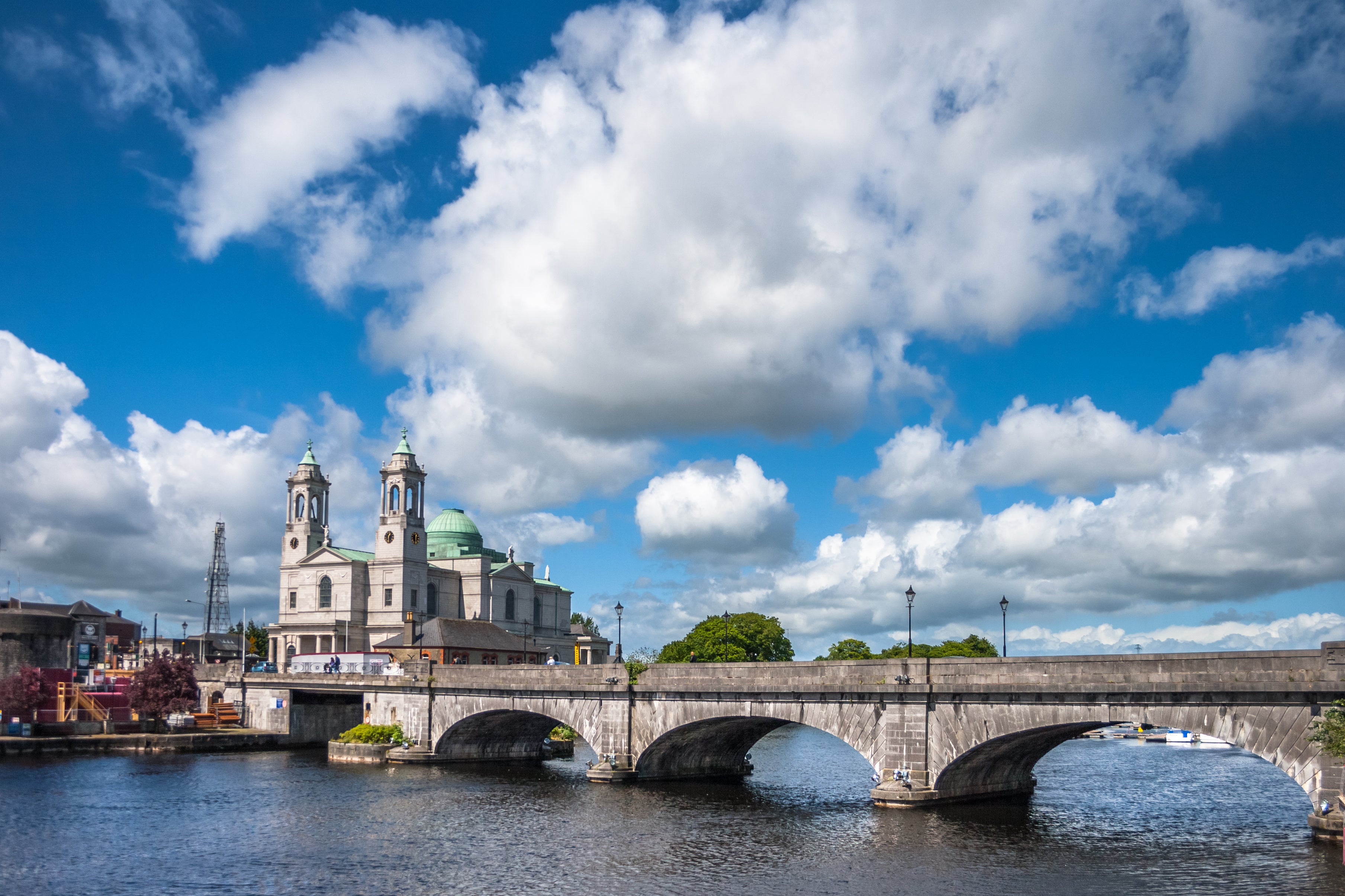 Stone bridge over wide river