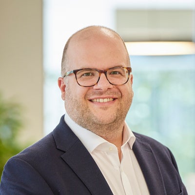 Head and shoulder shot of Joe Marshall, SNG Chief Investment and Development Officer