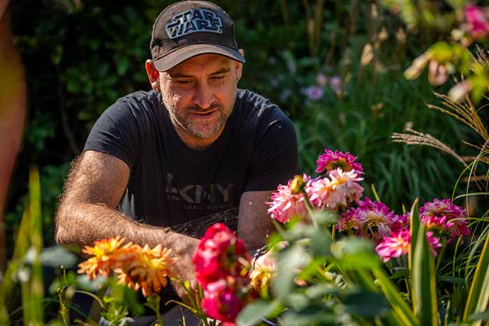 2024 SNG in Bloom winner Luke Carpenter with the plants in his garden