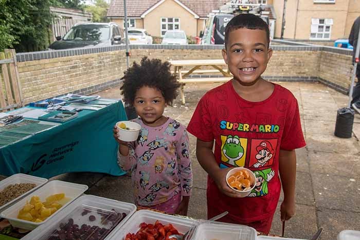 Two children who live at Ashtree Court posing