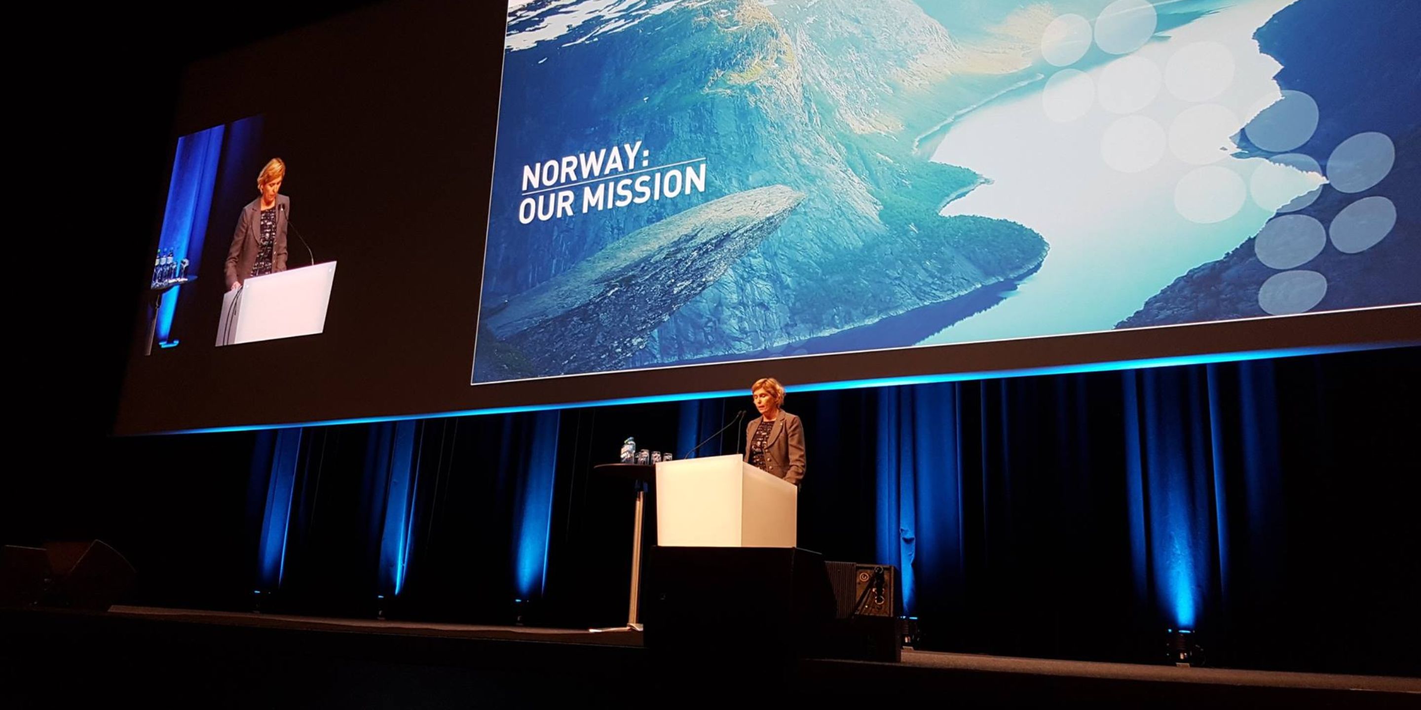 Trude speaking at a GHGT conference.