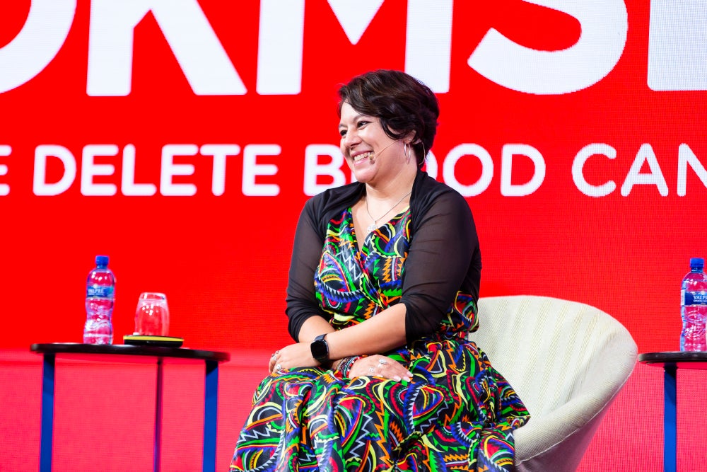 Alana James Country Executive Director DKMS Africa seated at launch event Alana James Country Executive Director DKMS Africa seated at launch event