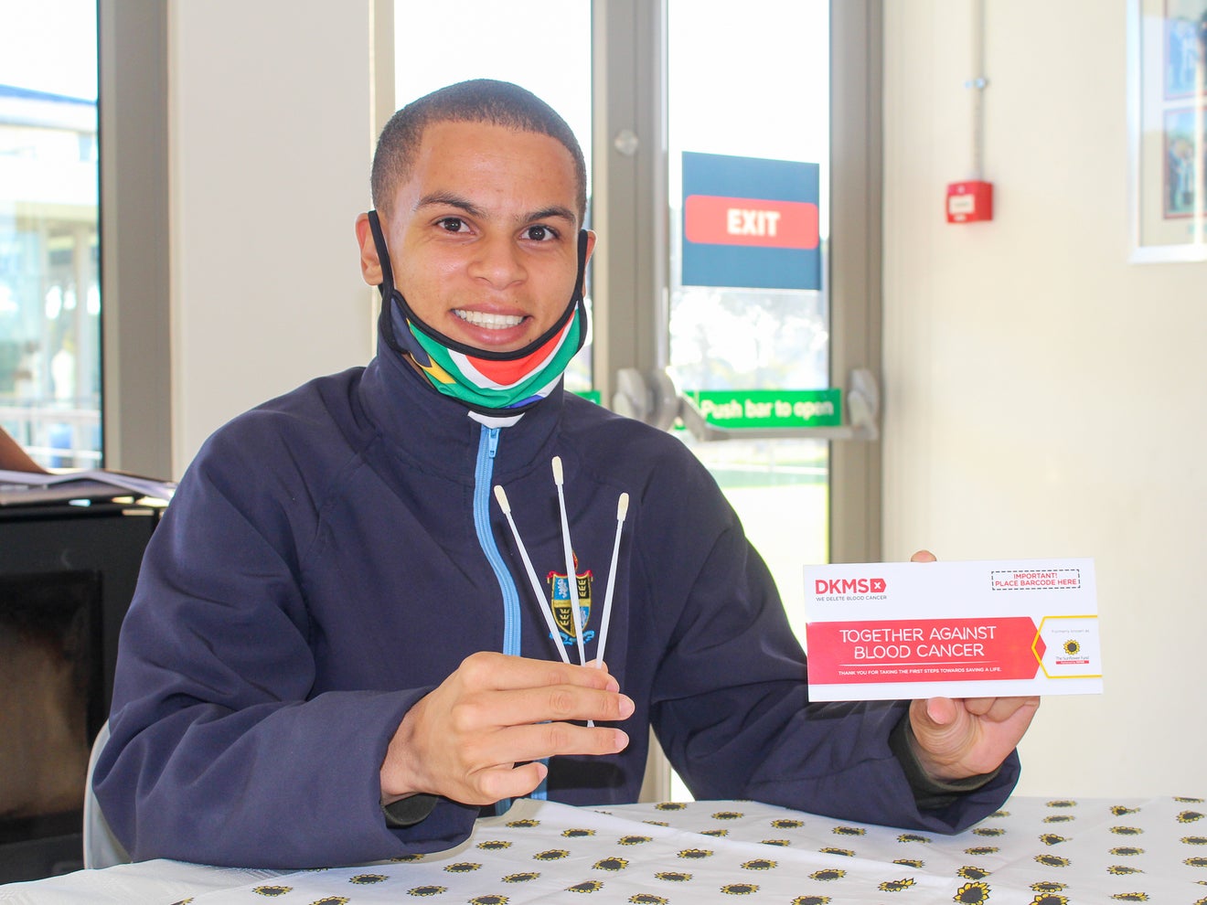 Donor with his swab kit