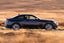BMW 2 Series Coupe Review 2024: exterior side photo of the BMW 2 Series Coupe on the road