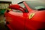 ferrari rojo de lado
