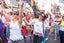 A crowd of people with flags celebrating Brighton Pride