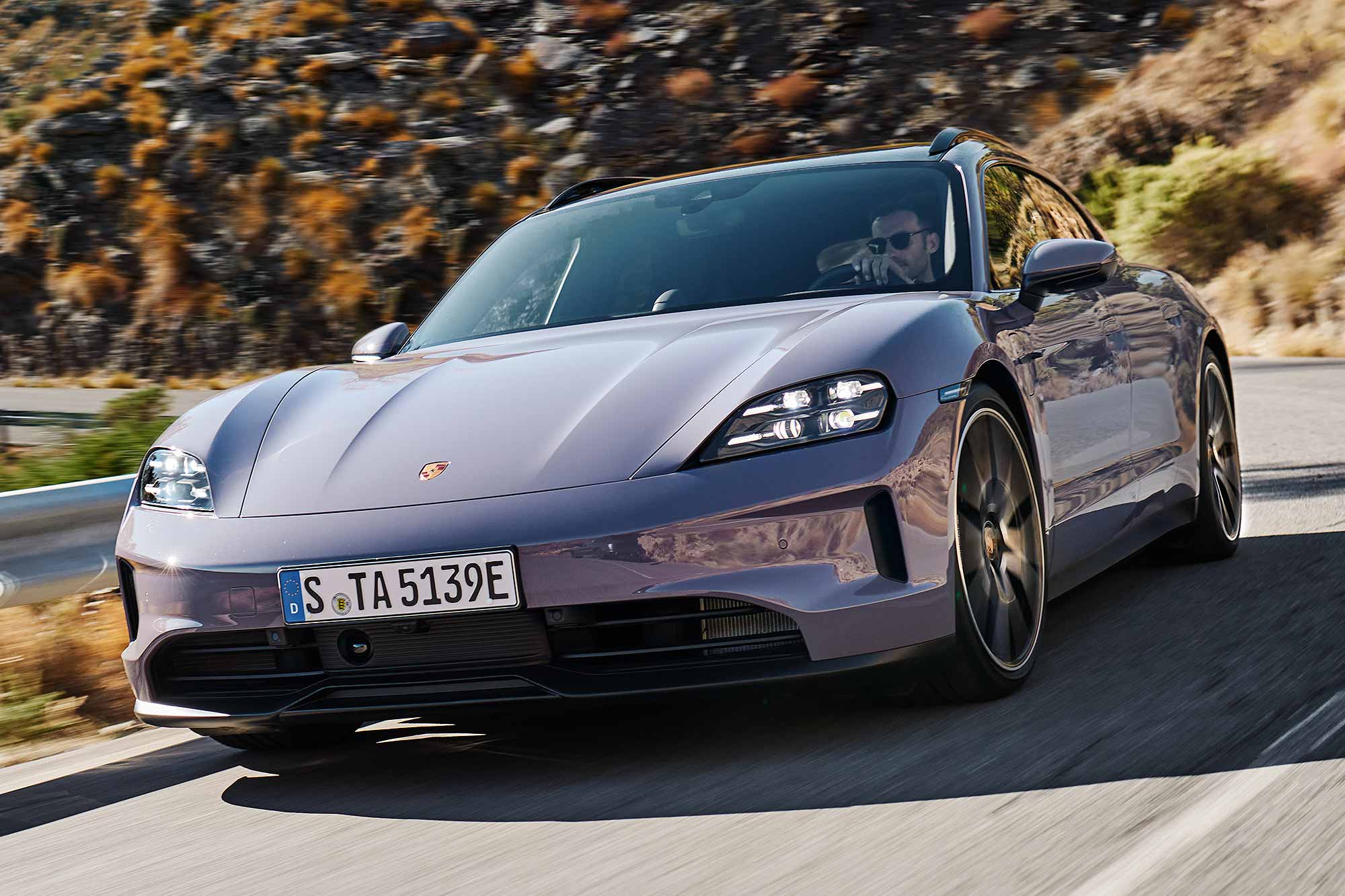 The new Porsche Taycan has updated headlights and newly-contoured front wings.