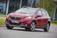 Peugeot 2008 (2013-2019) Review: exterior front three quarter photo of the Peugeot 2008 on the road