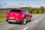 Alfa Romeo Stelvio Review: exterior rear three quarter photo of the Alfa Romeo Stelvio on the road