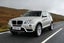BMW X3 (2010-2018) Review: Exterior front three quarter photo of the BMW X3 on the road