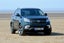 SsangYong Korando parked on beach