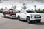 Mitsubishi L200 towing car trailer