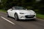 Mazda MX-5 Review 2023: exterior front three quarter photo of the Mazda MX-5 on the road