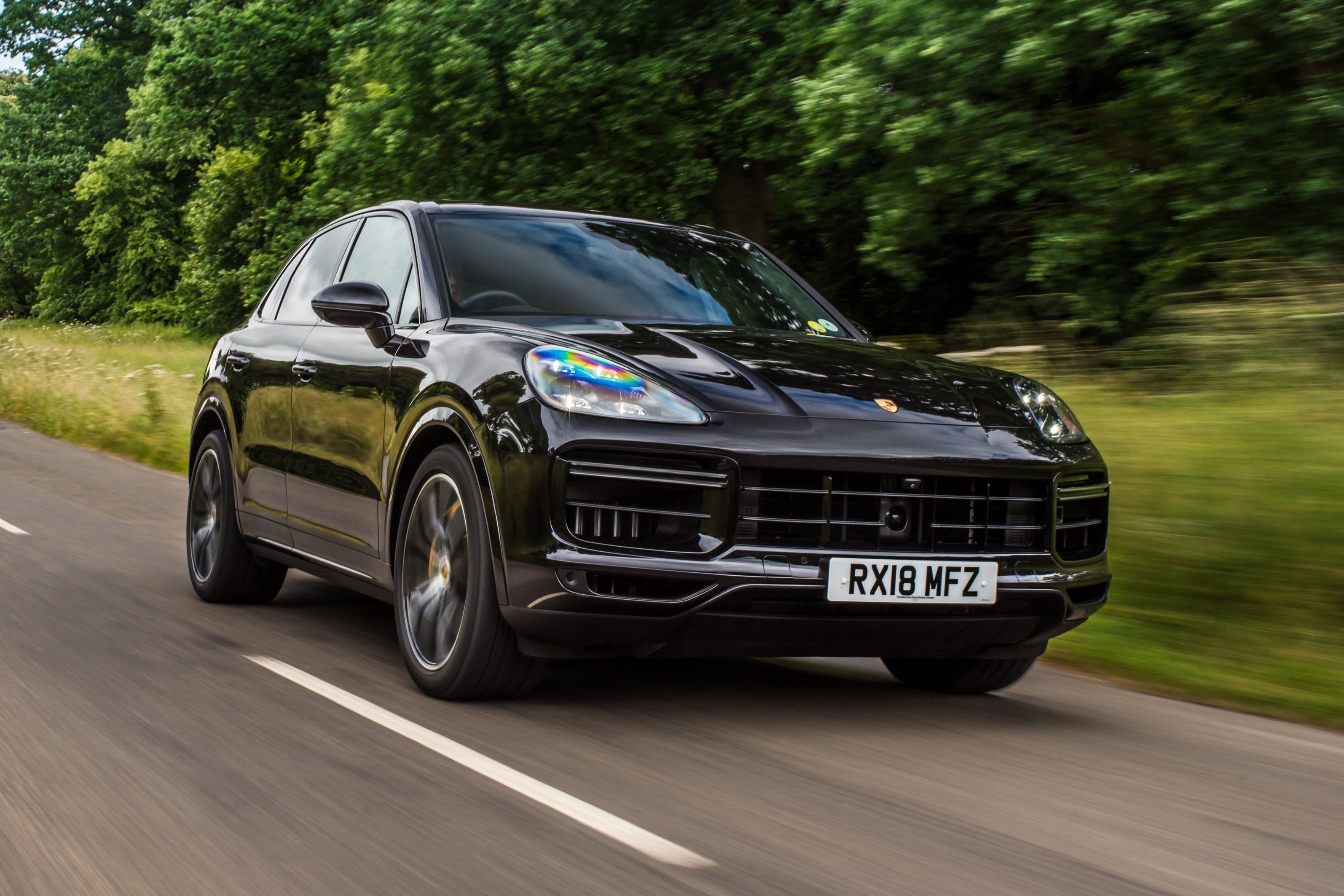 Porsche Cayenne Review 2023: exterior front three quarter photo of the Porsche Cayenne on the road