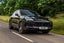 Porsche Cayenne Review 2023: exterior front three quarter photo of the Porsche Cayenne on the road