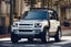 Land Rover Defender 110 Review 2023: exterior front three quarter photo of the Land Rover Defender 110 on the road