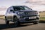 Jeep Compass Review 2024: exterior front three quarter photo of the Jeep Compass on the road