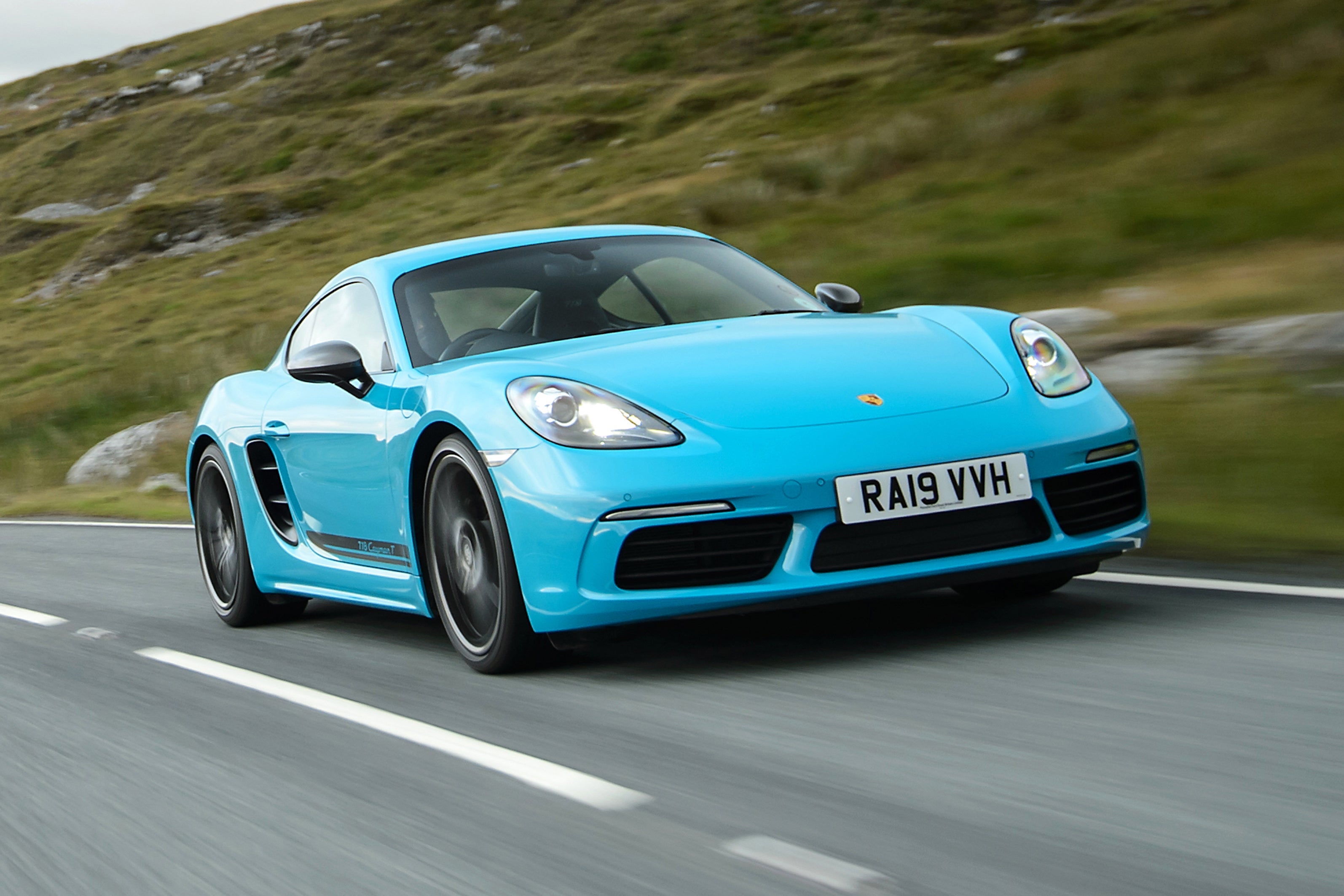 Porsche 718 Cayman Review 2023: exterior front three quarter photo of the Porsche 718 Cayman on the road