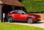 Mazda MX-30 Review 2023: Soul Red exterior electric charge point