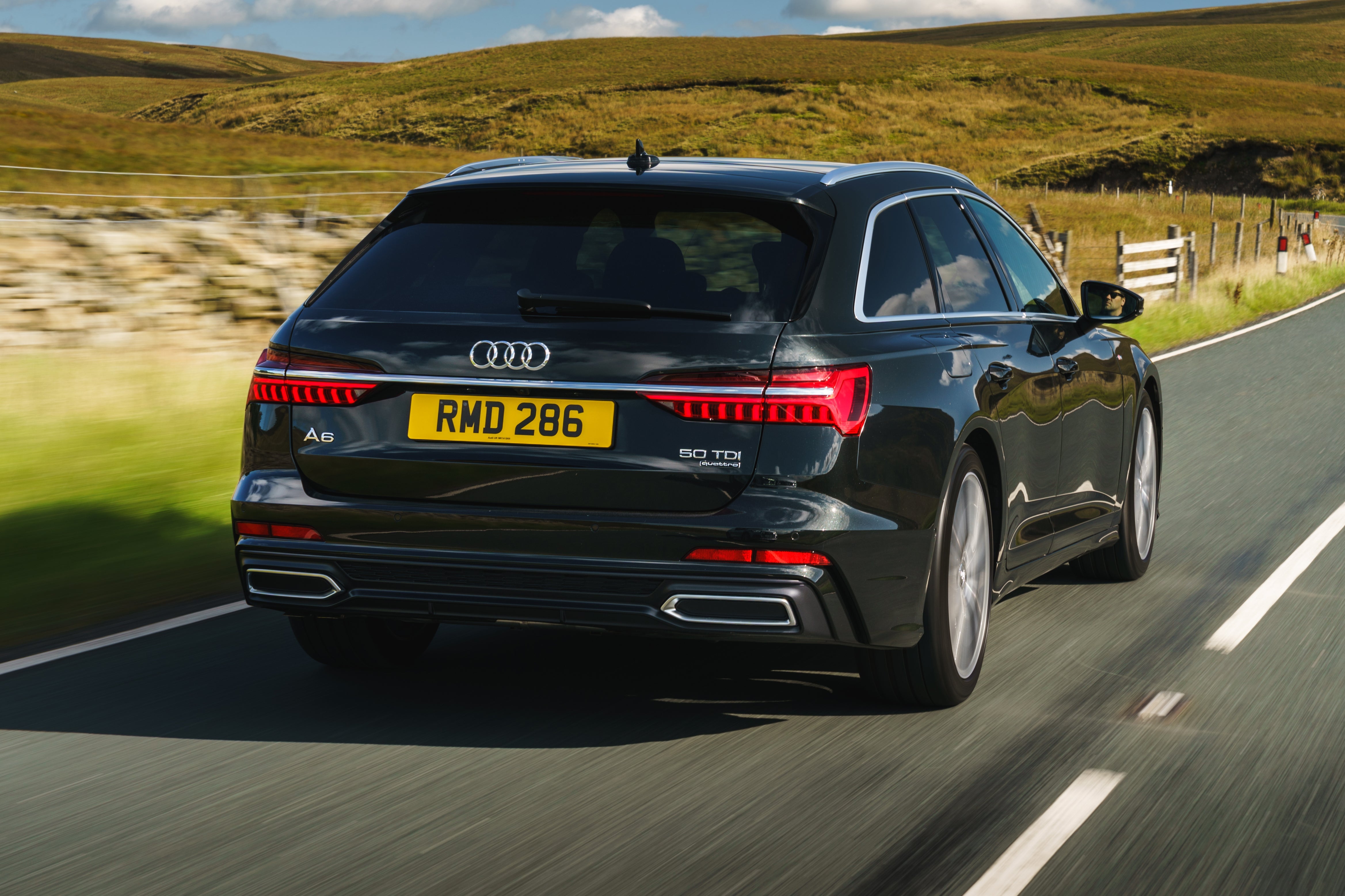  Audi A6 Avant Review 2023: rear three quarter photo of the Audi A6 Avant on the road 