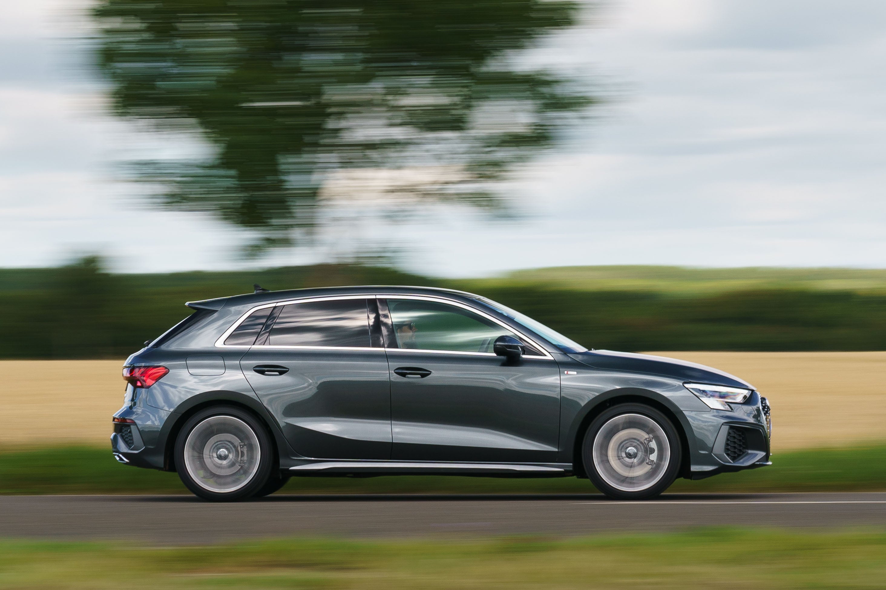 Audi A3 Review 2023: side exterior photo of the Audi A3 Sportback on the road