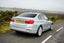 BMW 3 Series (2012-2018) Review: Exterior rear three quarter photo of the BMW 3 Series on the road