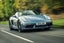 Porsche 718 Boxster Review 2023: exterior front three quarter photo of the Porsche Boxster 718 on the road