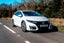 Honda Civic Tourer (2014-2017) Review: exterior front three quarter photo of the Honda Civic Tourer on the road