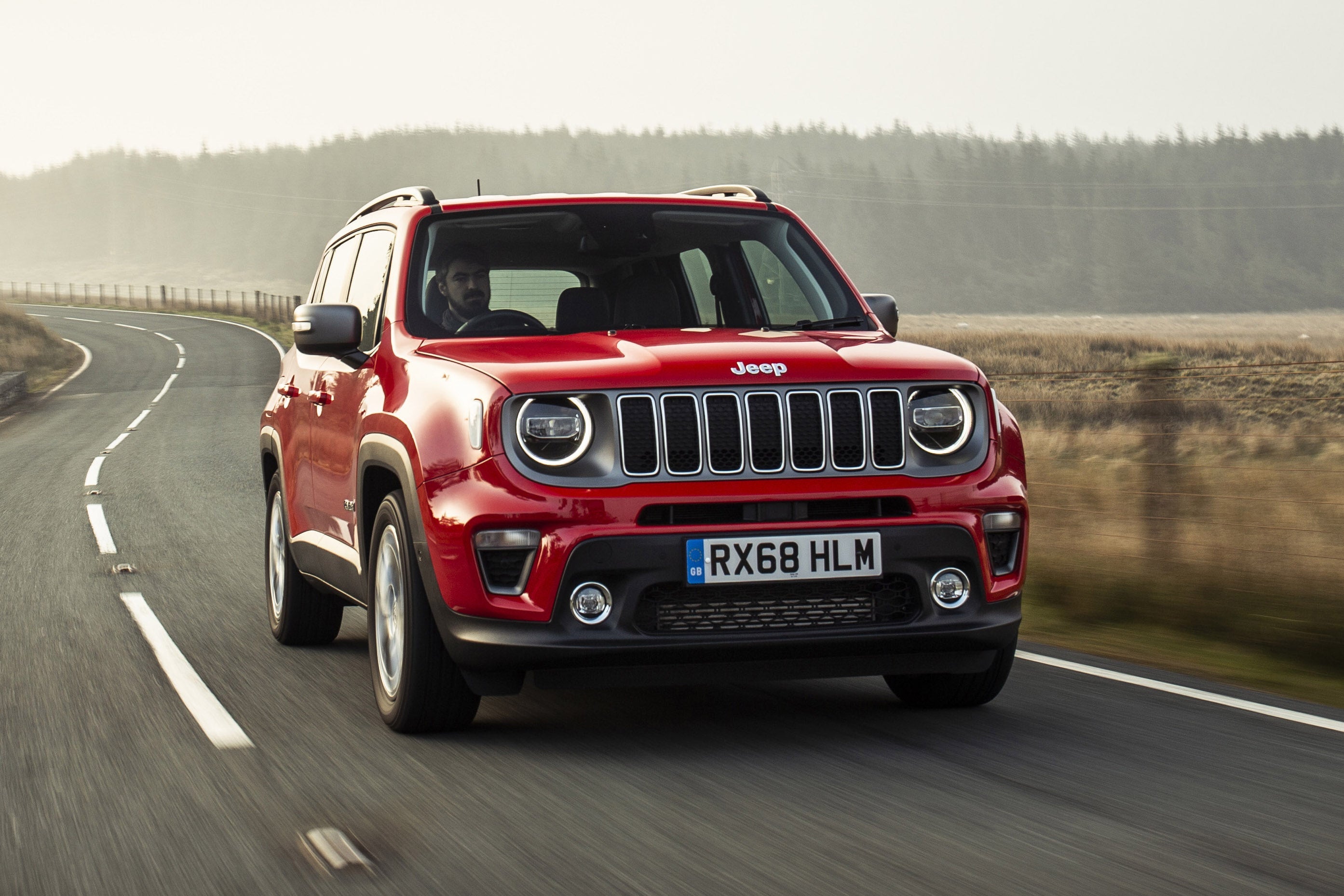 Jeep Renegade Review 2023: exterior front three quarter photo of the Jeep Renegade on the road