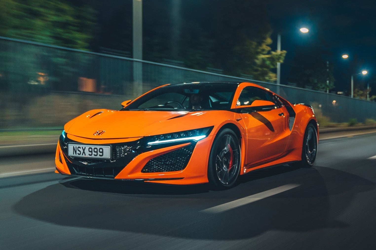 Honda NSX Review 2023: exterior front three quarter photo of the Honda NSX on the road
