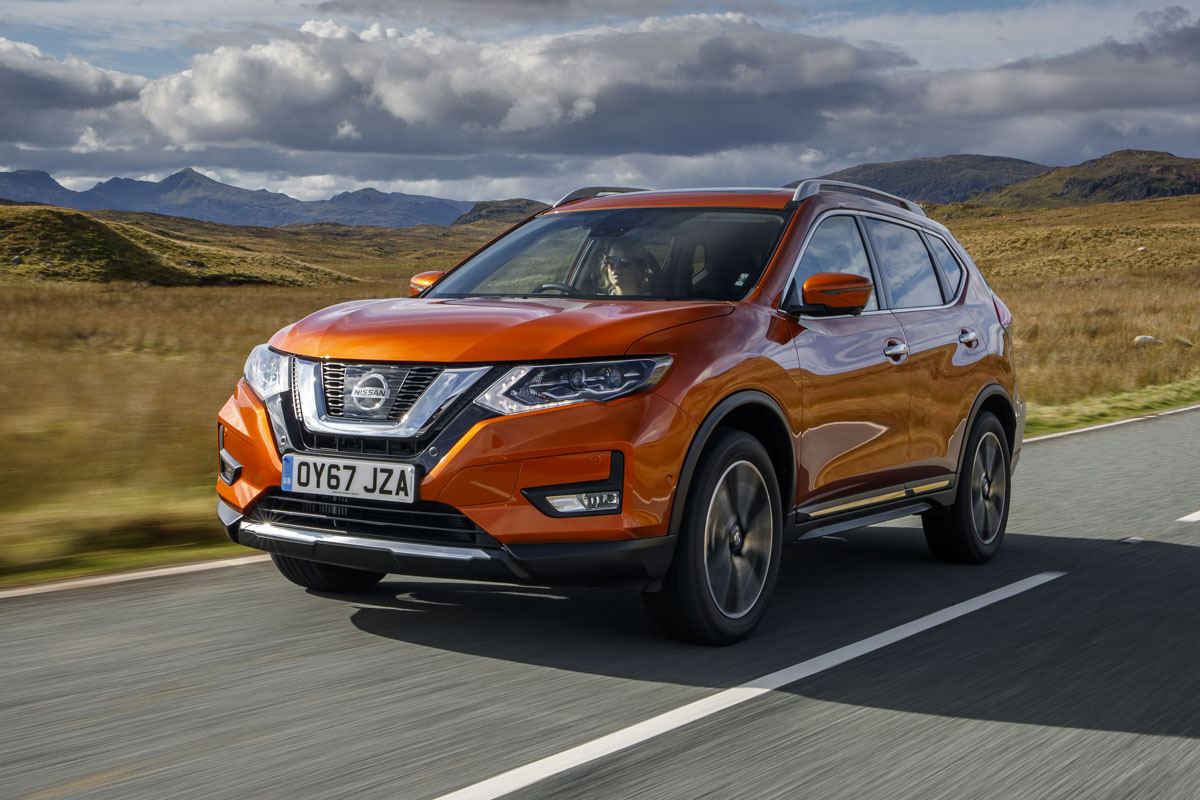 Nissan X-Trail (2013-2022) Review: exterior front three quarter photo of the Nissan X-Trail on the road