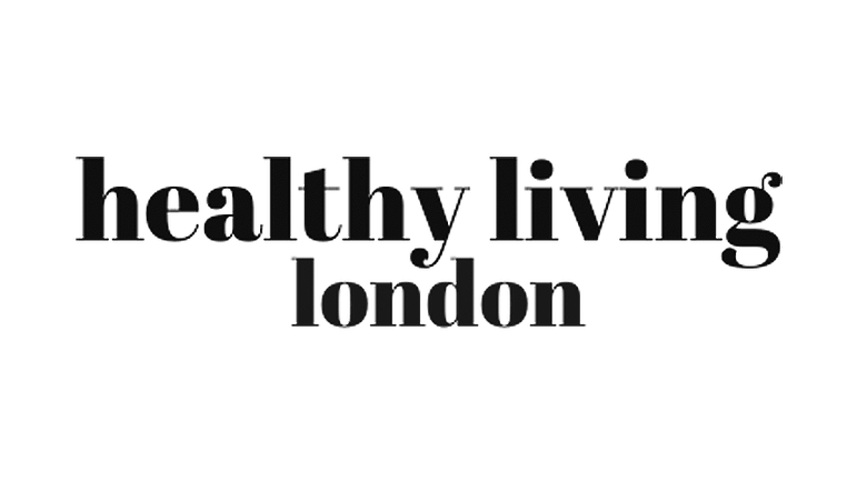 the healthy living london logo in black on a white background