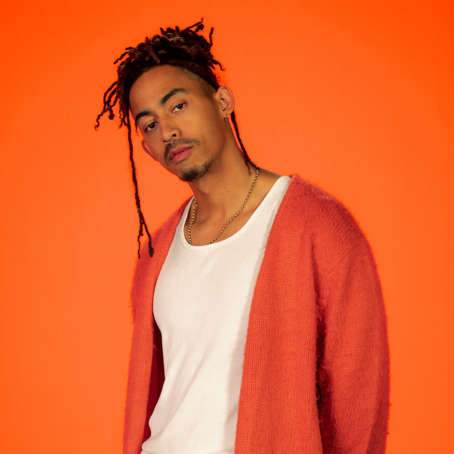 a photo of jordan stephens for the go humans academy on an orange background