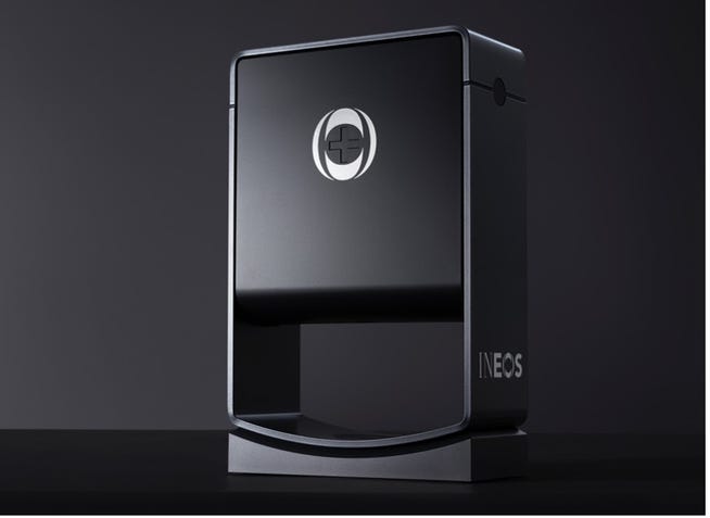 a photo of a black ineos hygienics hand sanitiser dispenser