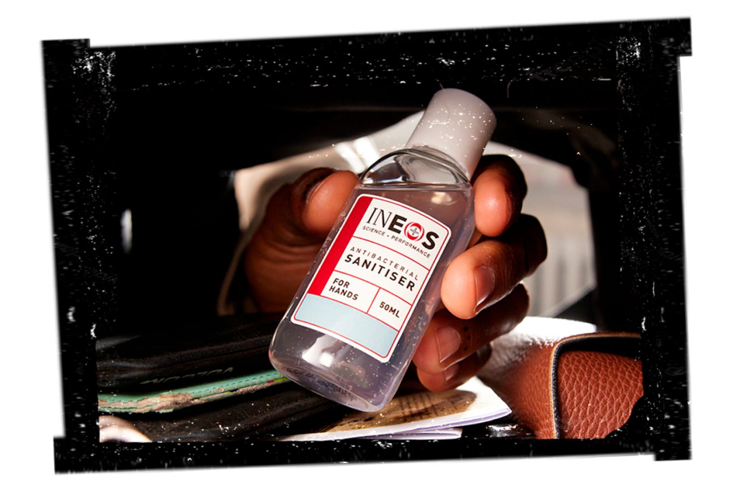 a thumbnail showing someone holding a travel size bottle of ineos hygienics sanitiser