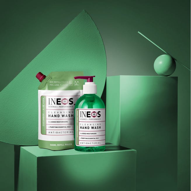 a photo of ineos hygienics cleansing aloe vera and cucumber hand wash on an abstract green background