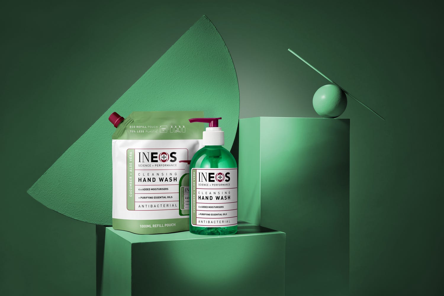 a photo of ineos hygienics aloe vera hand wash range with green shapes in the background