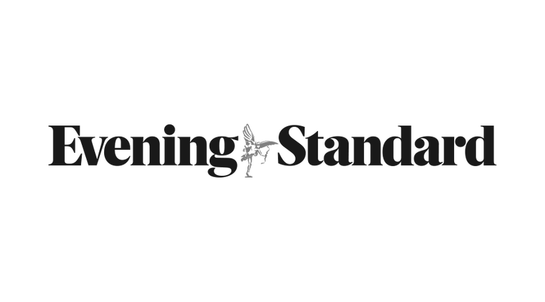 the evening standard logo in black on a white background