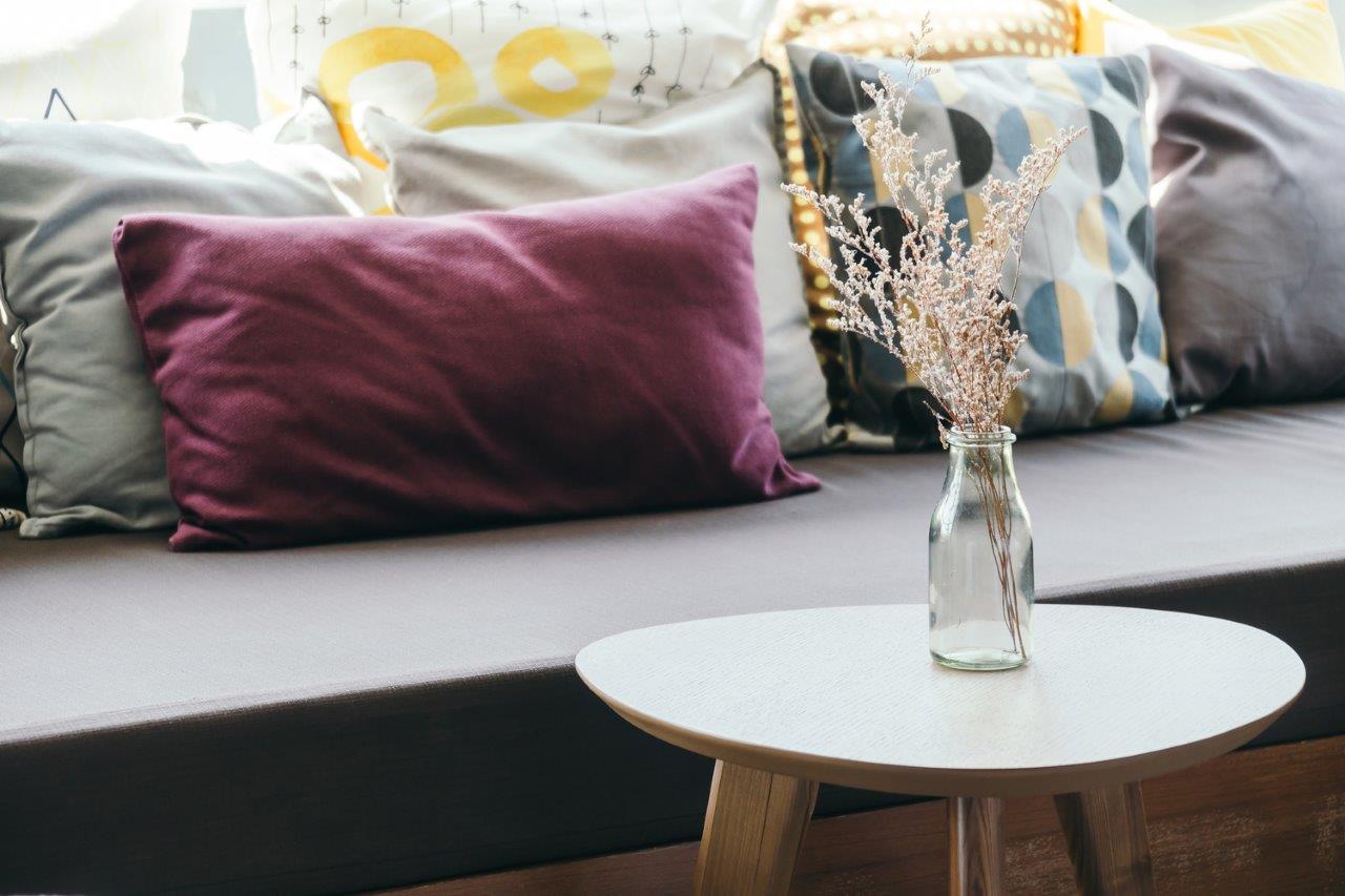 Living room with colourful cushions on the couch