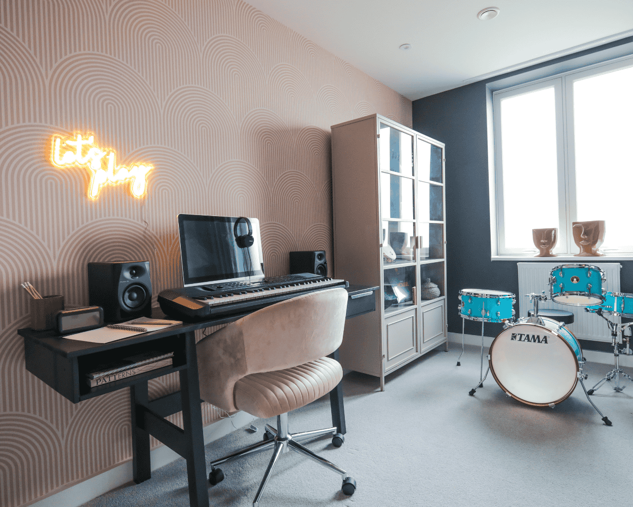Show home photo of a bedroom styled as a home office at The Restorey.