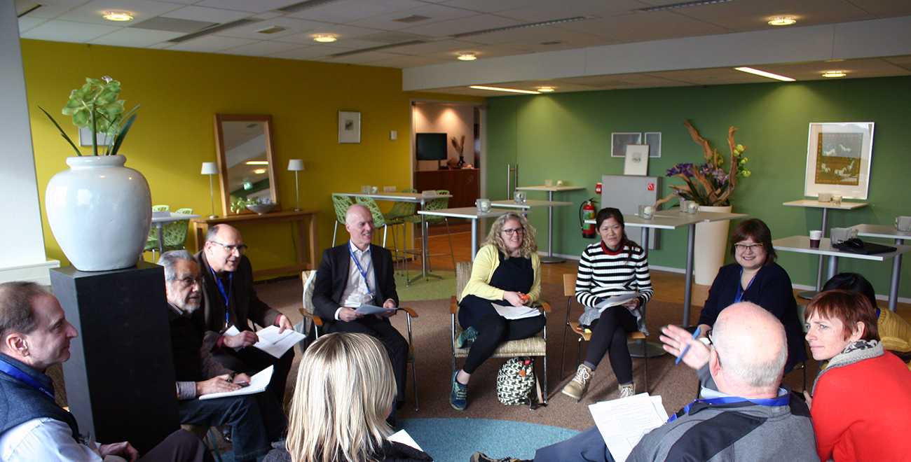 People sitting in a circle following an EPA course