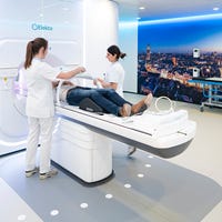 Nurses preparing a patient for treatment in the MR-Linac