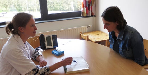 aios in gesprek met patient