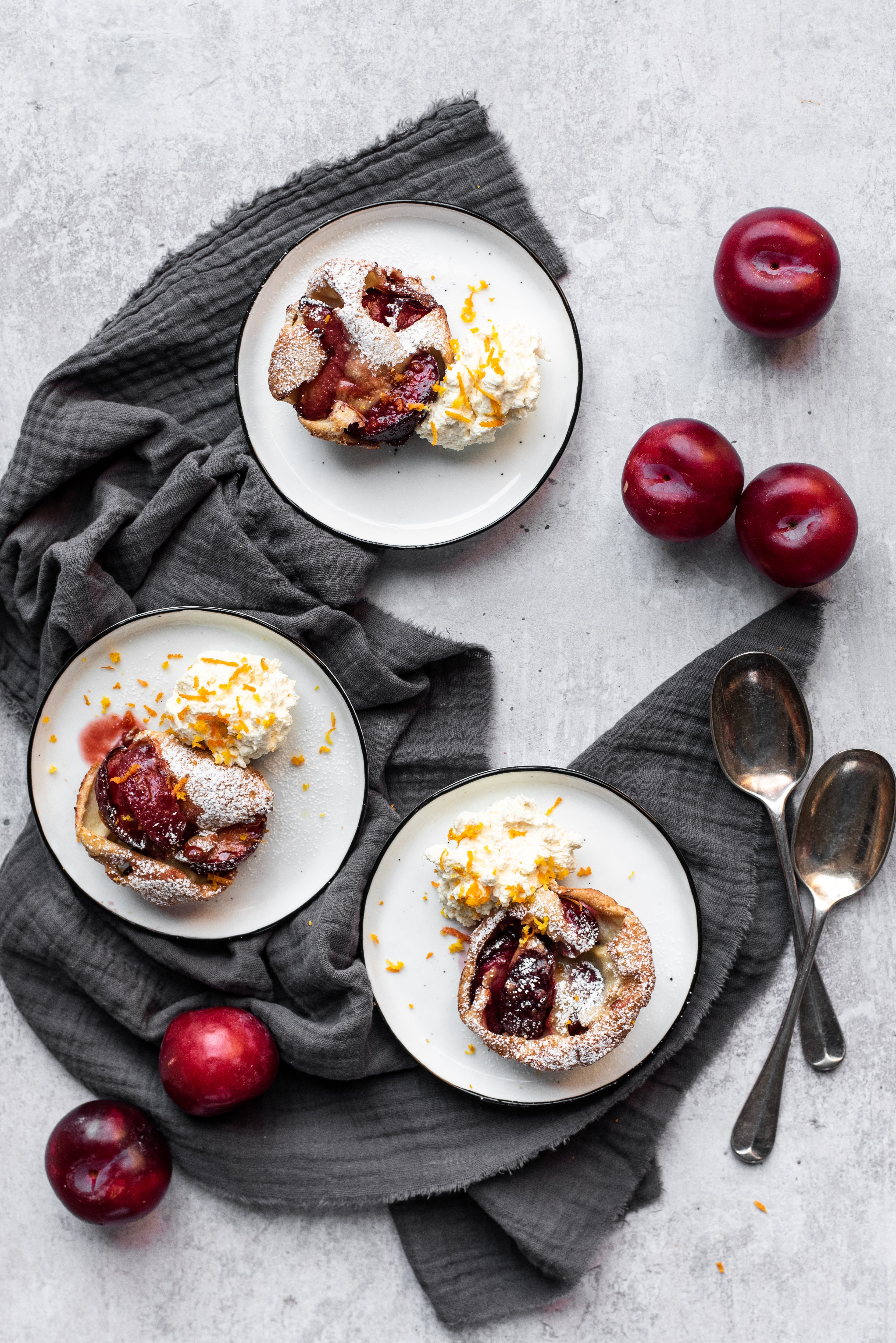 caramelised plum Yorkshire puddings on plates