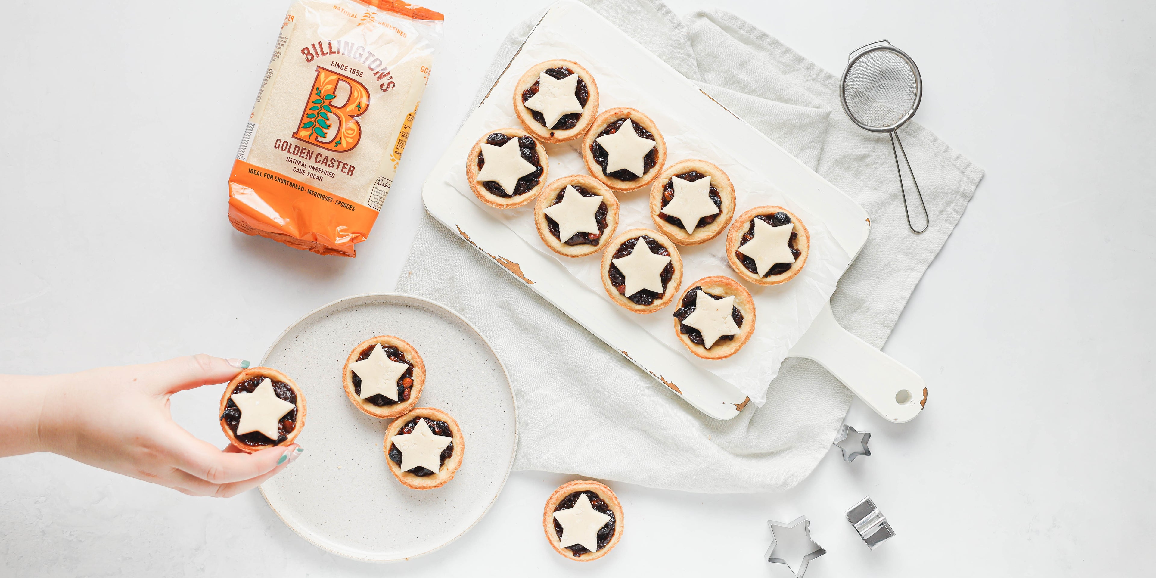 A top down view of a board of vegan mince pies