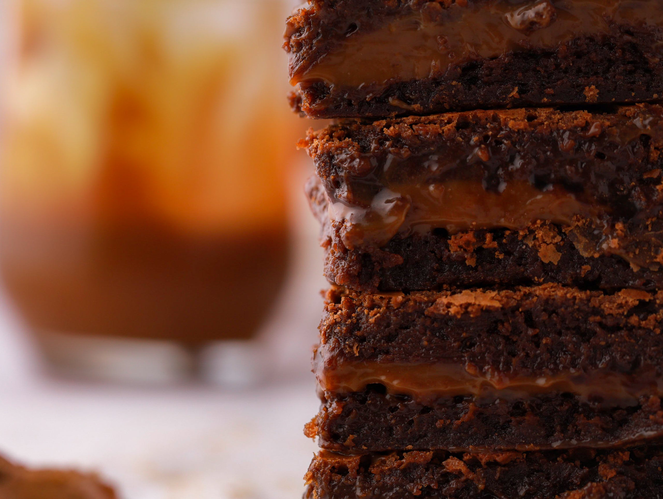 Close up shot of brownie slices stacked on top of each other