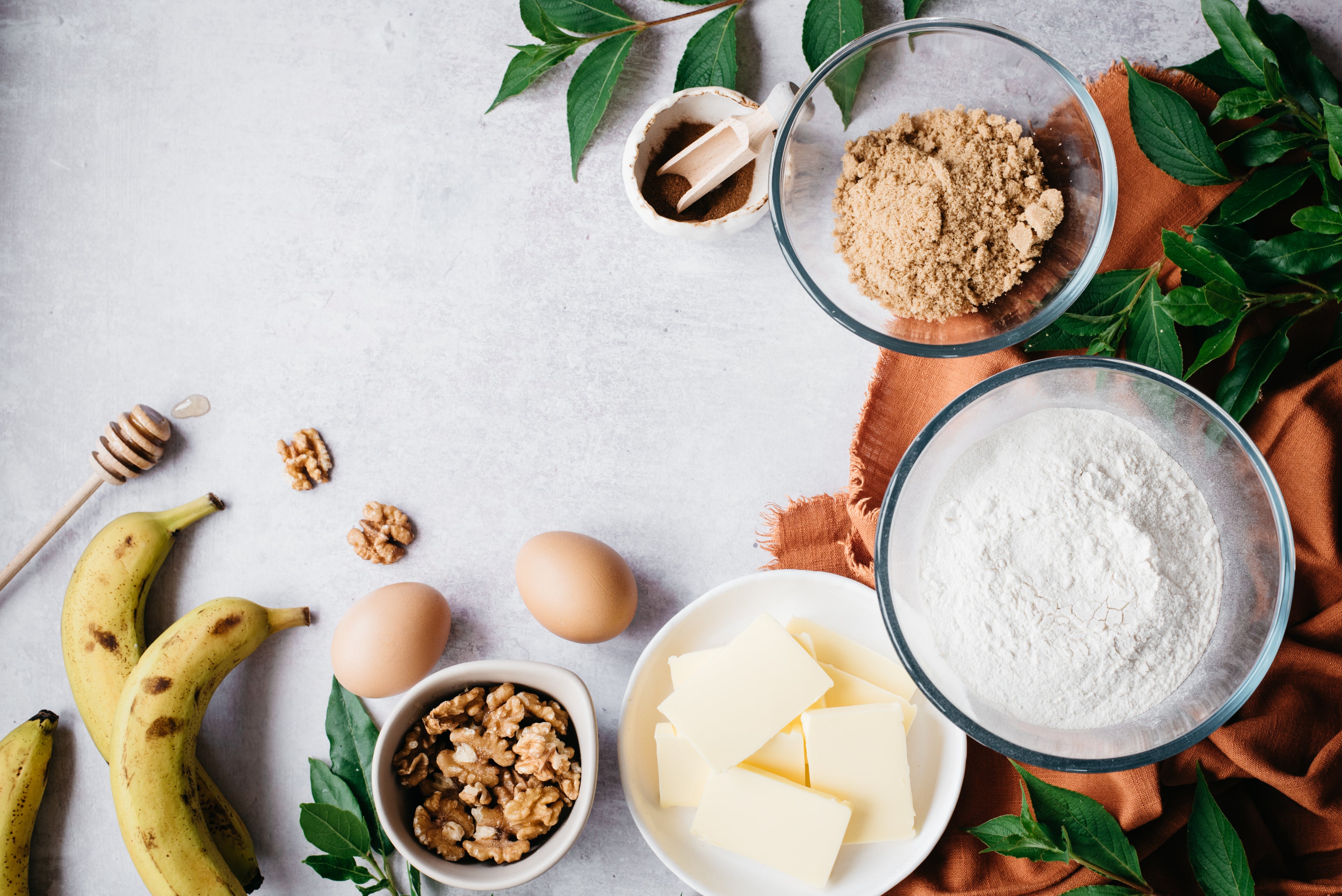 Top down view of healthy banana bread ingredients including truvia for baking brown