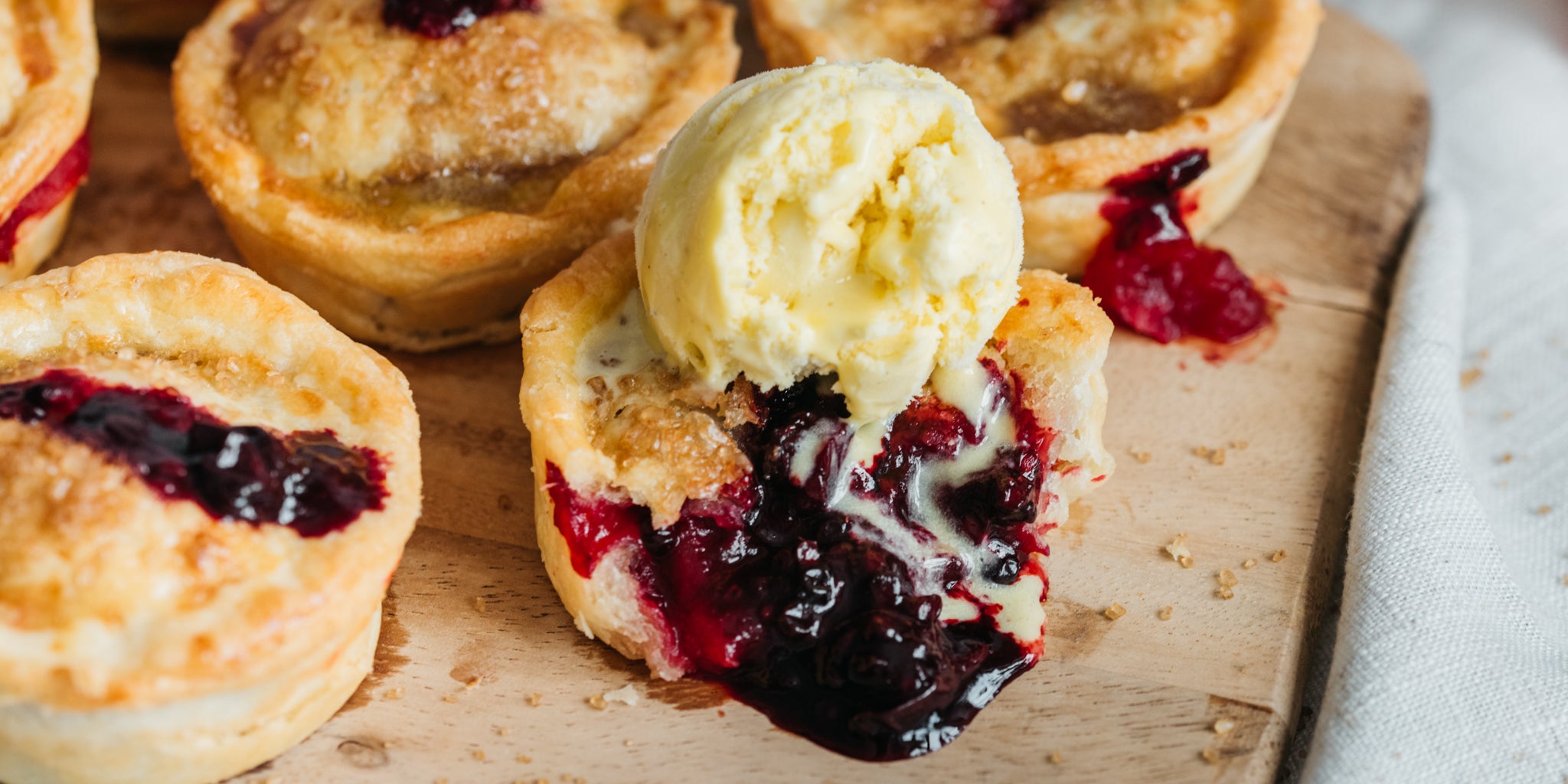 Apple and blackberry fruit pie with scoop of ice cream