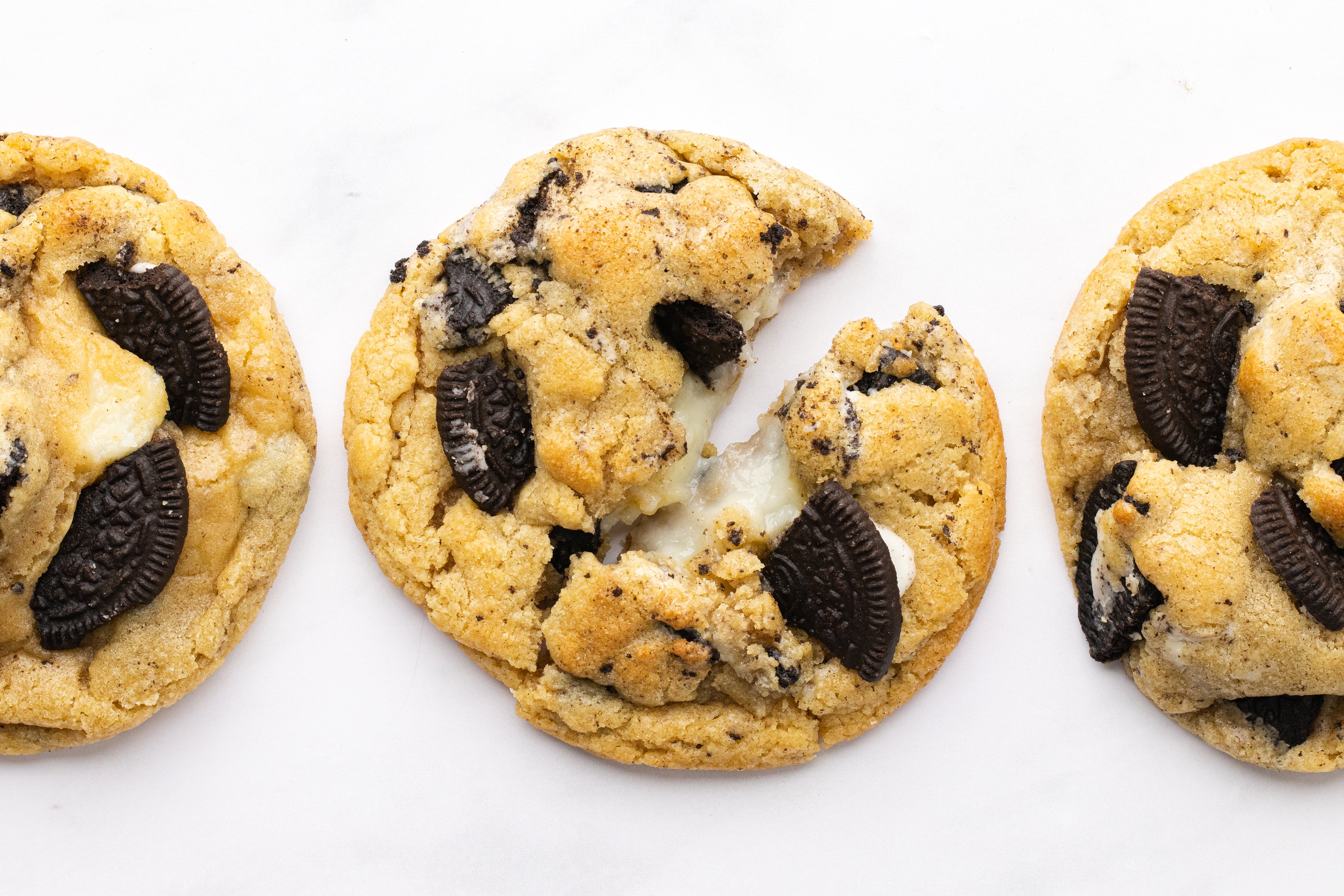 Baked cookies pulled apart on baking tray