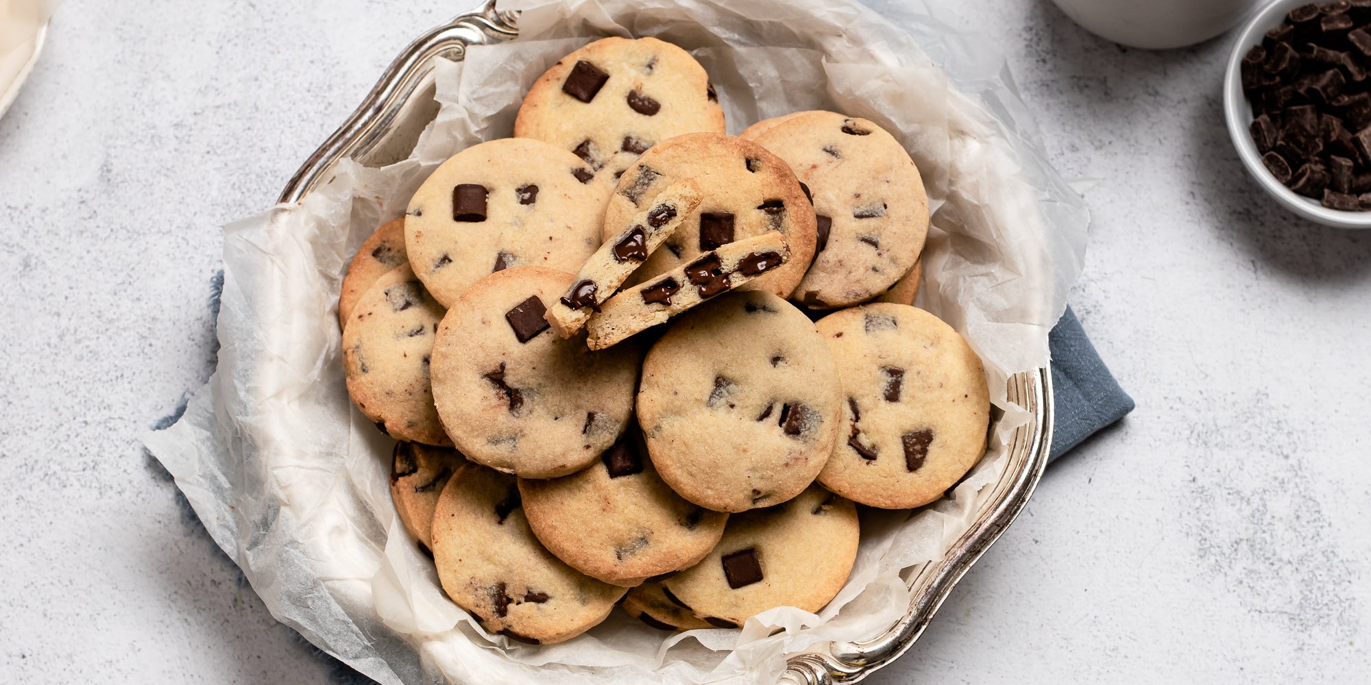 A batch of Chocolate Chunk Shortbread in a cookie tin